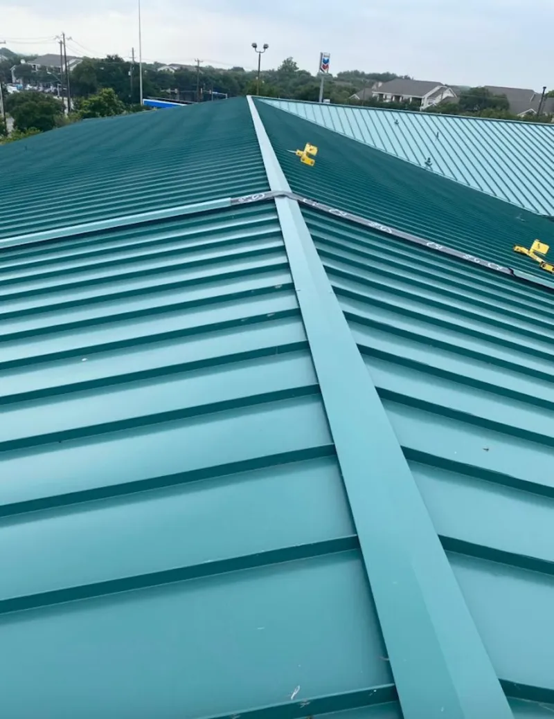 Green commercial metal roof ridge and valley for Metal Roof Repair in Winter Beach